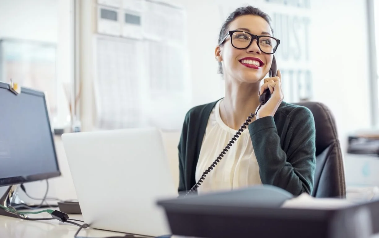 woman on a landline phone