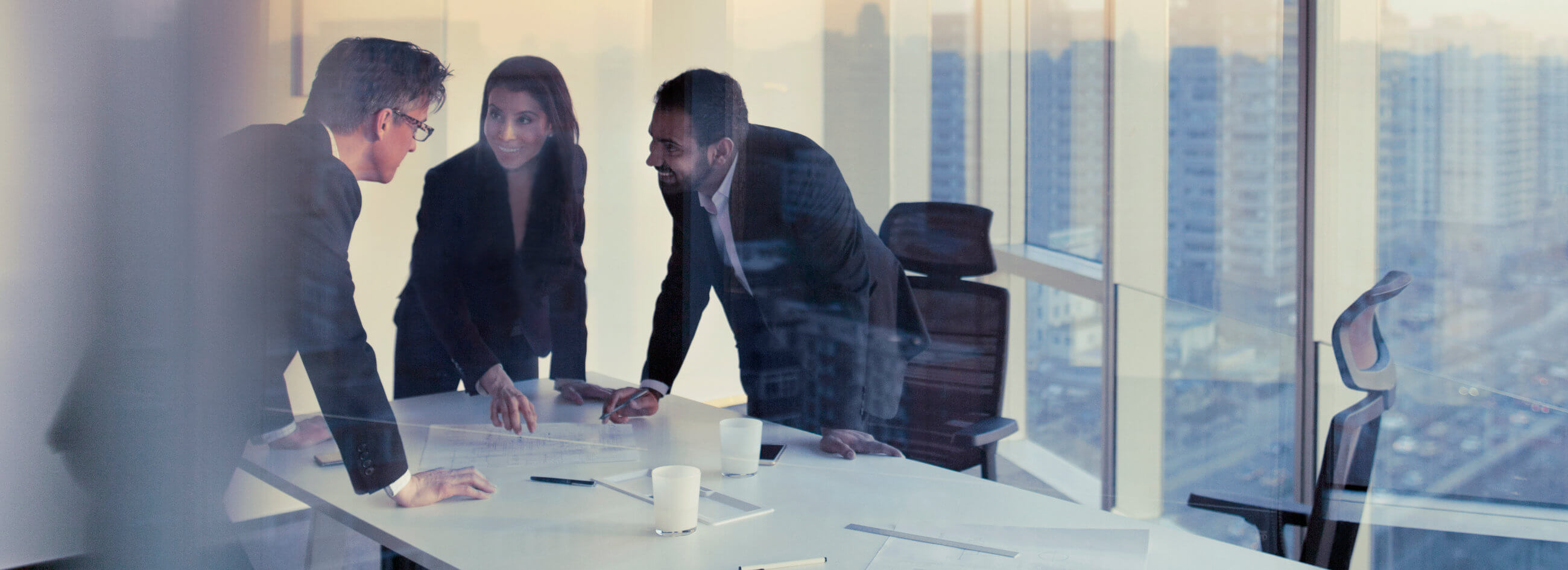 a diverse group of business associates in a conference room